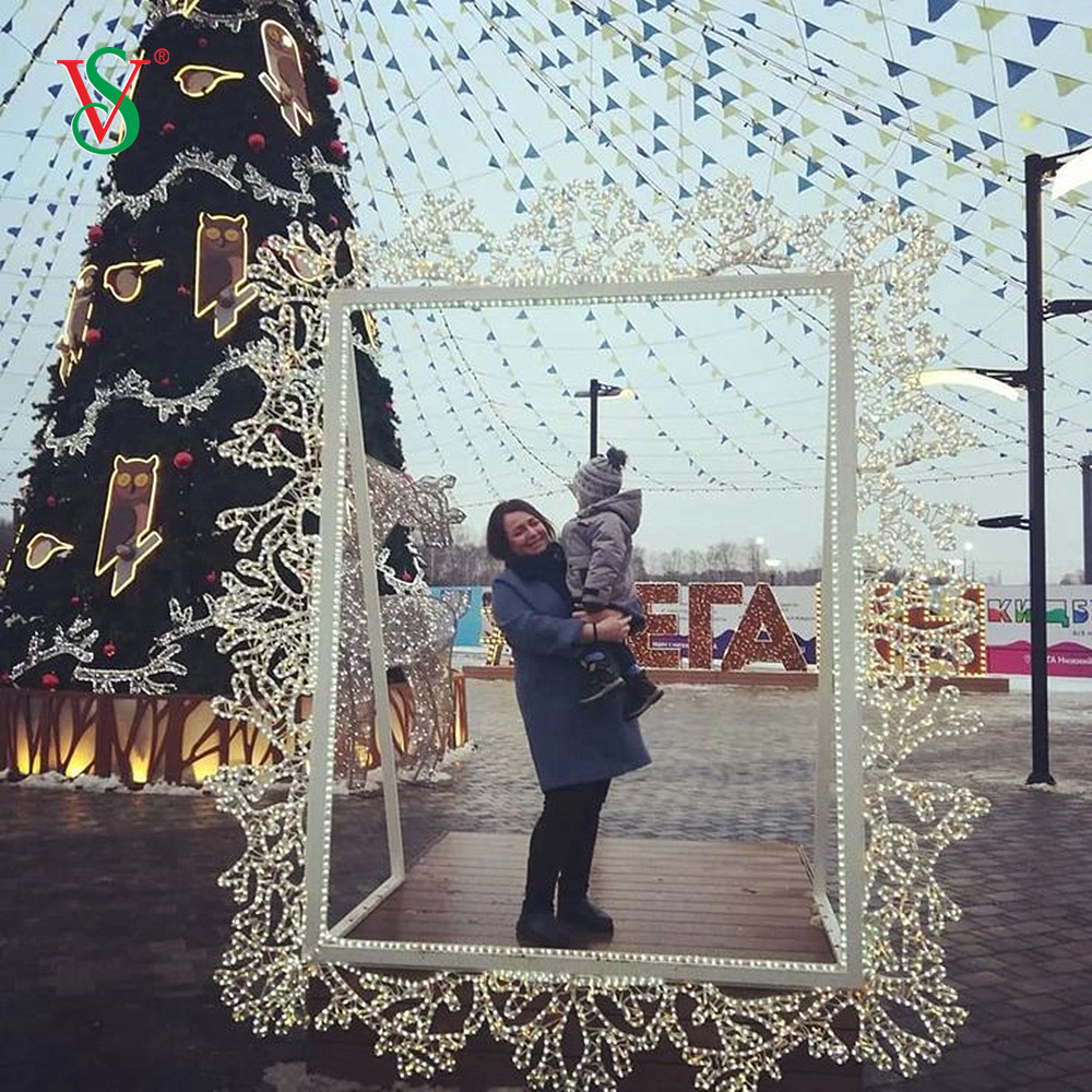 Освещать рождественскую фоторамку для Рождества фотографировать