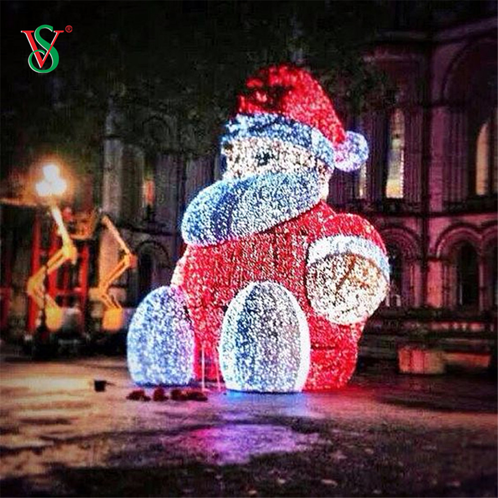 На открытом воздухе 3D лыжные лыжи сидят Санта -Клаус Мотильные огни на рождественские каникулы